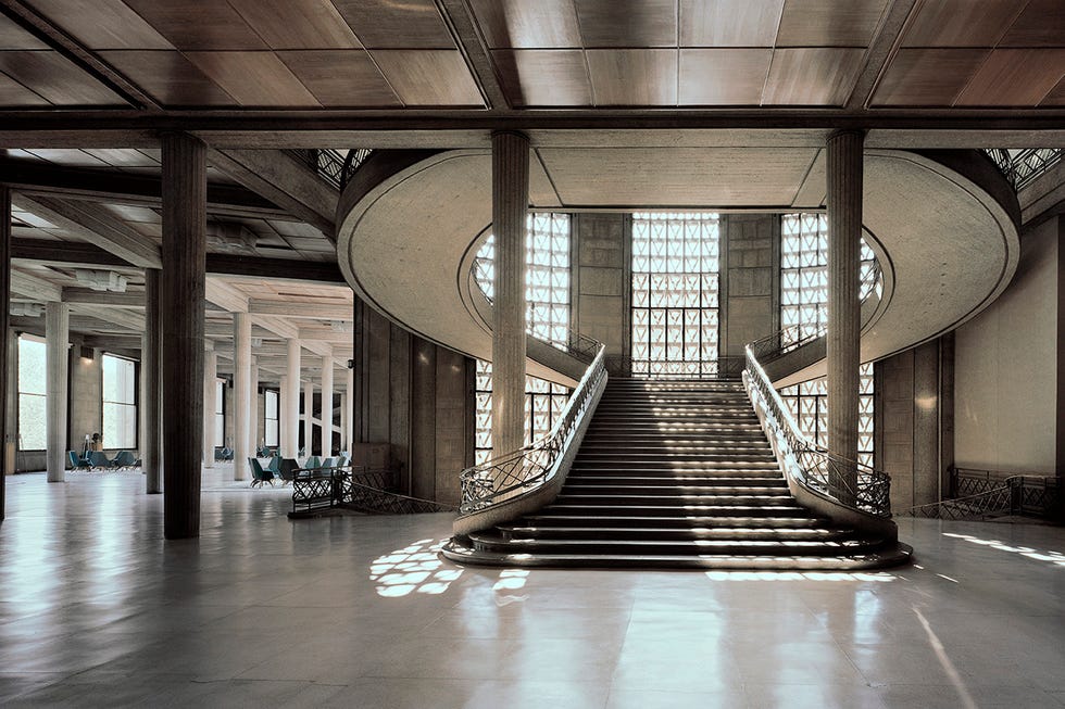 interior of a modern architectural space featuring a grand staircase