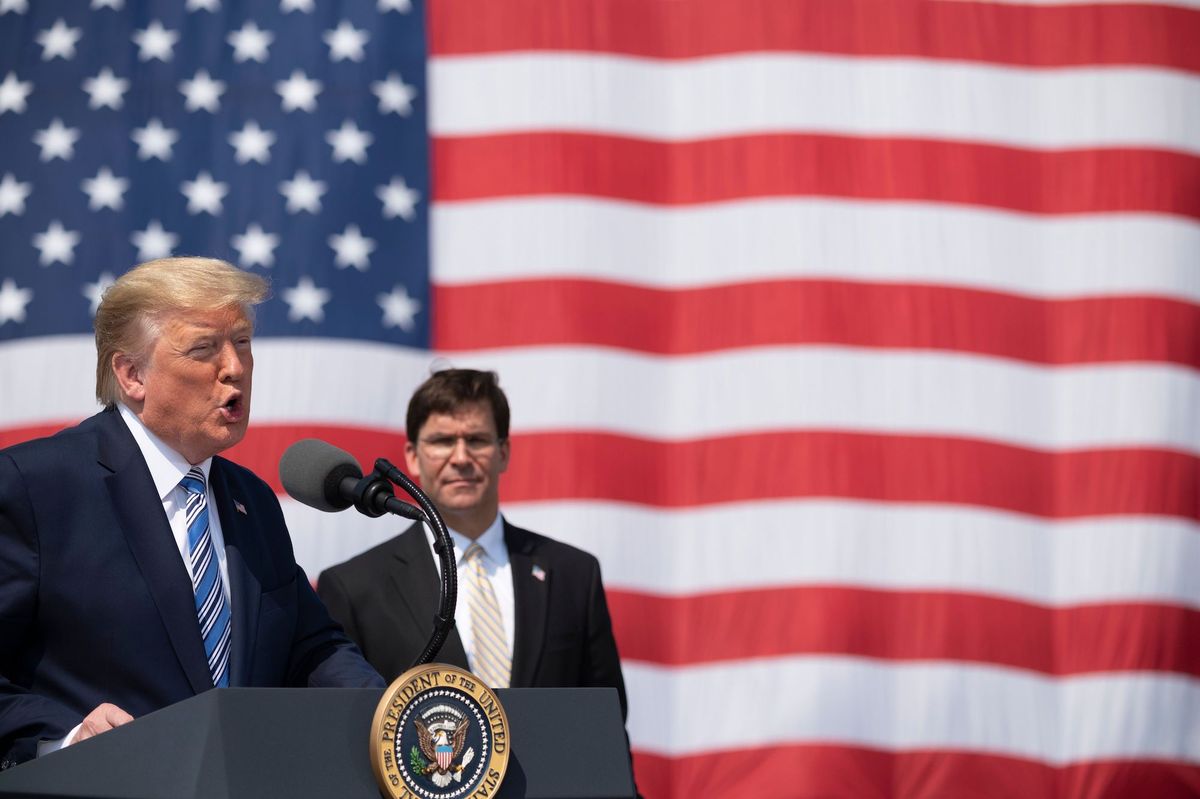 us president donald trump, with defense secretary mark esper, speaks during the departure ceremony for the hospital ship usns comfort at naval base norfolk on march 28, 2020, in norfolk, virginia   the comfort sails to new york city to aid in the coronavirus outbreak photo by jim watson  afp photo by jim watsonafp via getty images