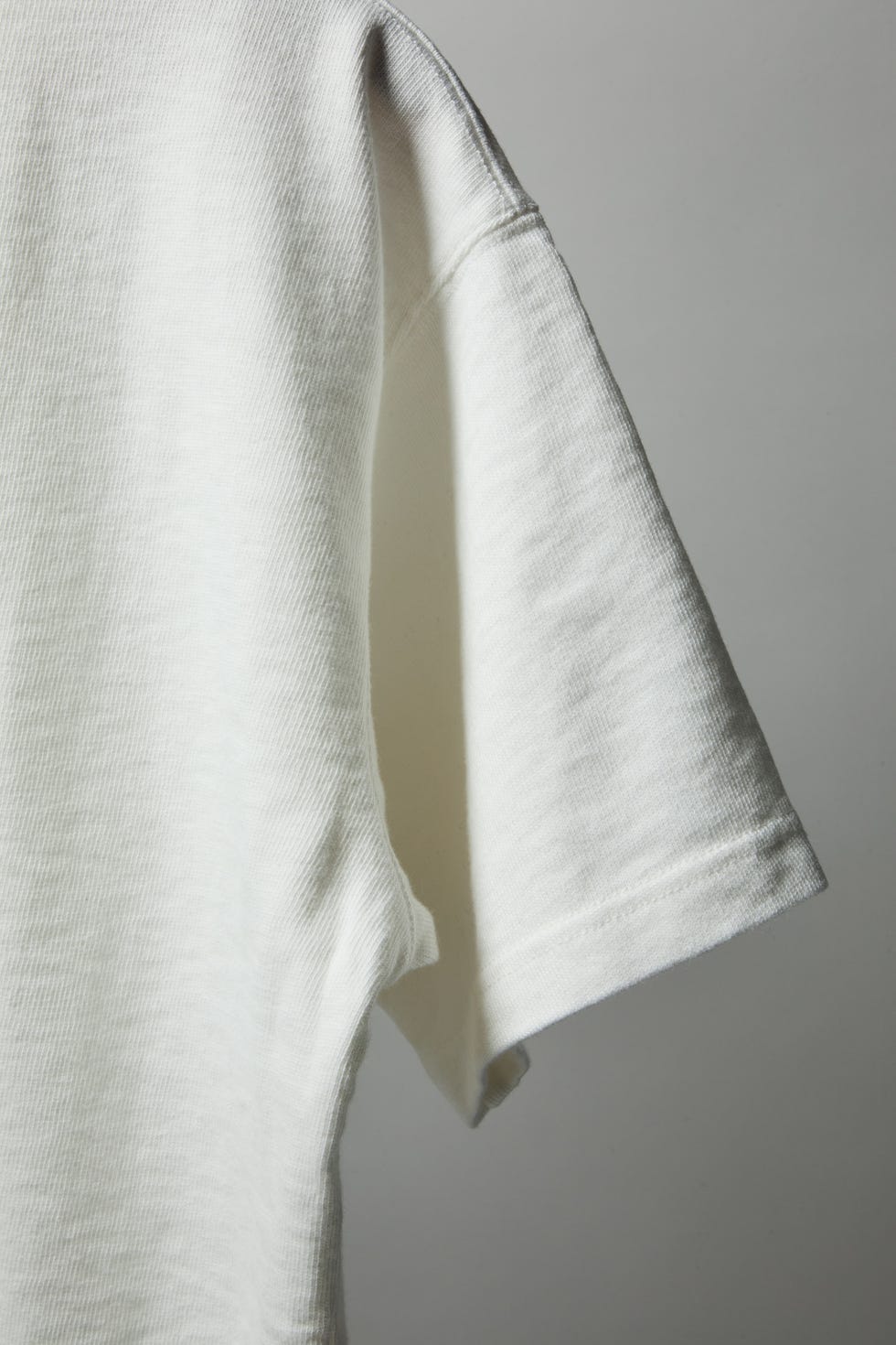 the sleeve of a white t shirt