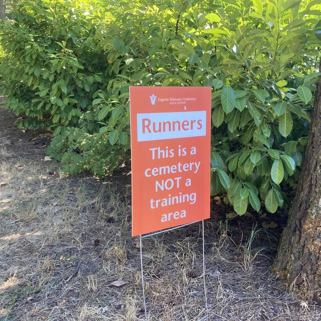 runners this is a cemetery not a training area sign
