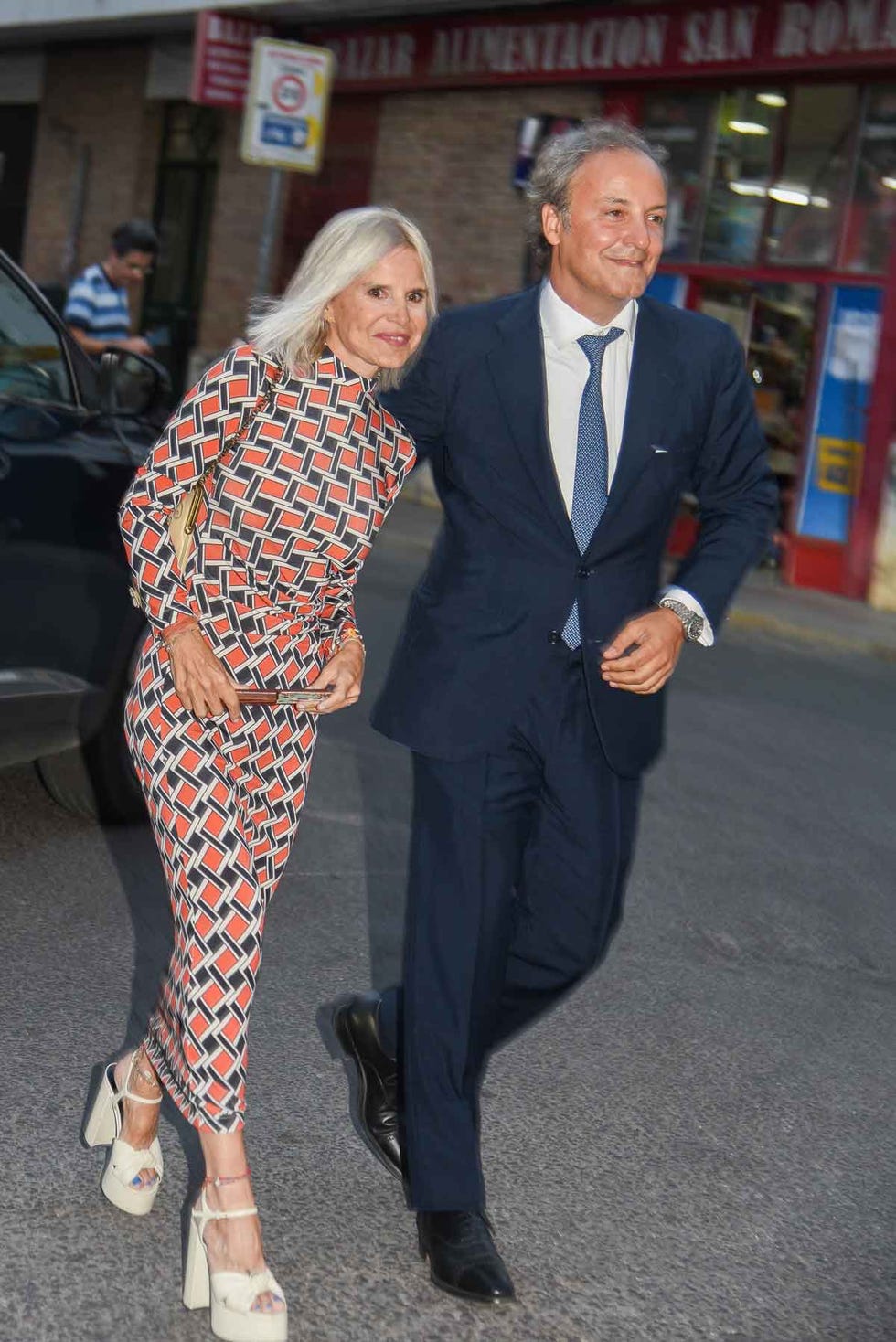 a man and woman walking
