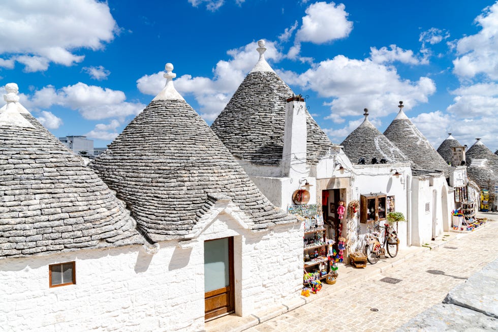 White Trulli huts in summer, Alberobello, Puglia europe bucket list