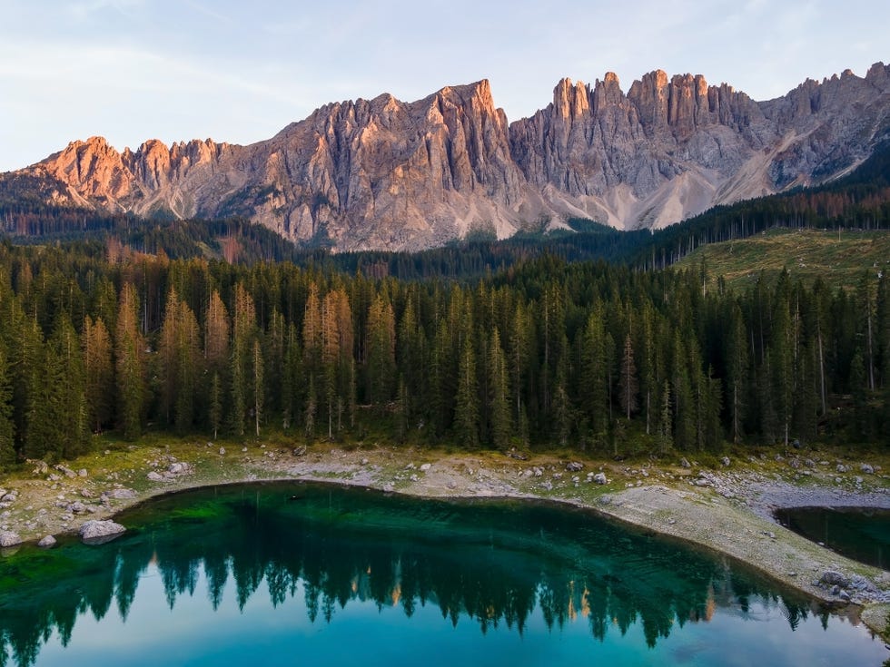 mountain landscape with a lake surrounded by trees