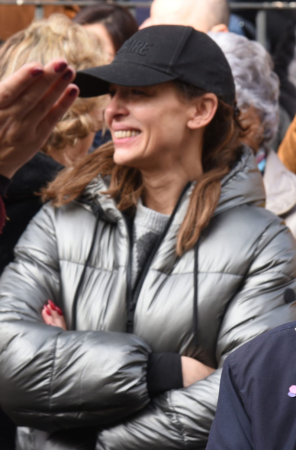 individuals gathered together outdoors during a public event