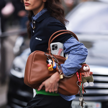 a person carrying a purse