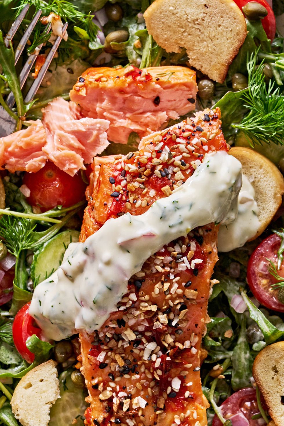 everything bagel crusted salmon with bagel chip salad and cream cheese dill dressing