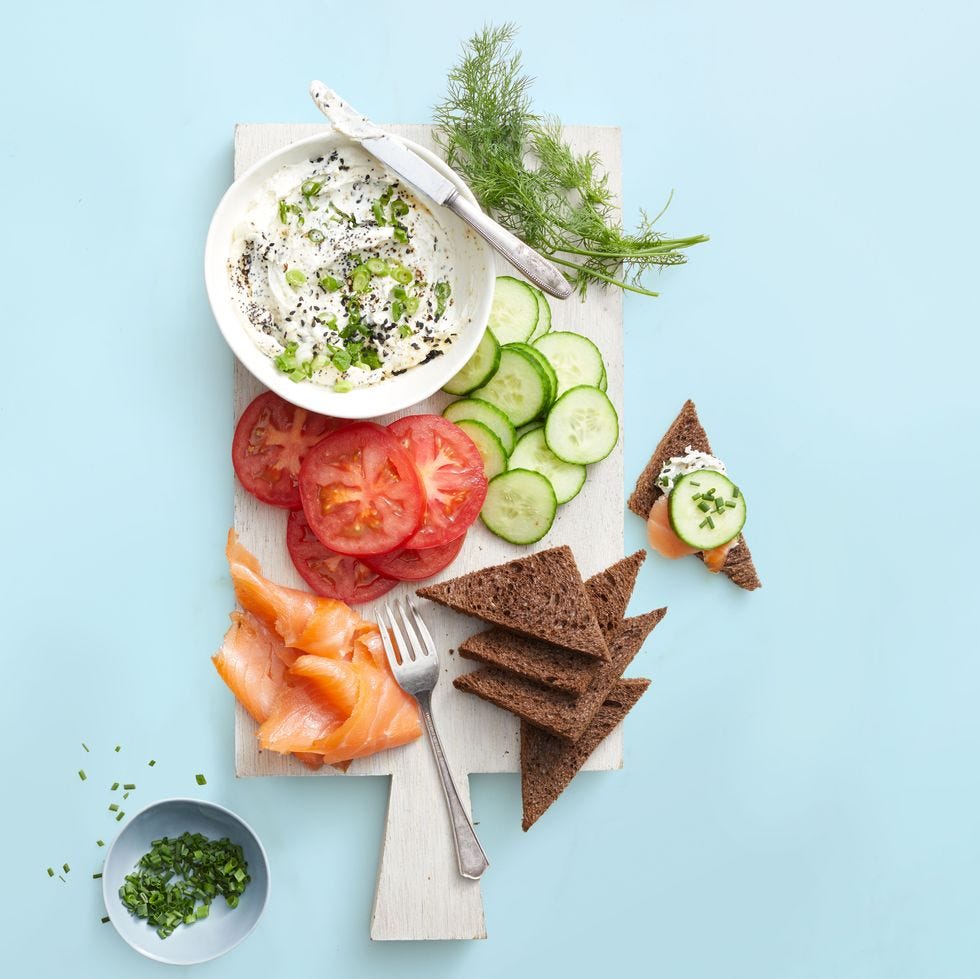 everything bagel dip with cucumber, tomato, lox slice and bread