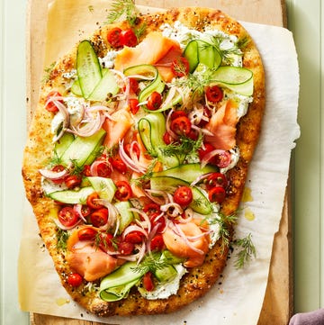 everything seasoning flatbread with cucumber ribbons, smoked salmon, and sliced tomatoes on top everything seasoning flatbread with cucumber ribbons, smoked salmon, and sliced tomatoes on top