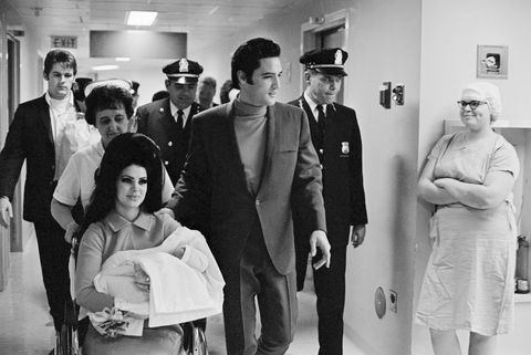 elvis with wife and daughter at hospital