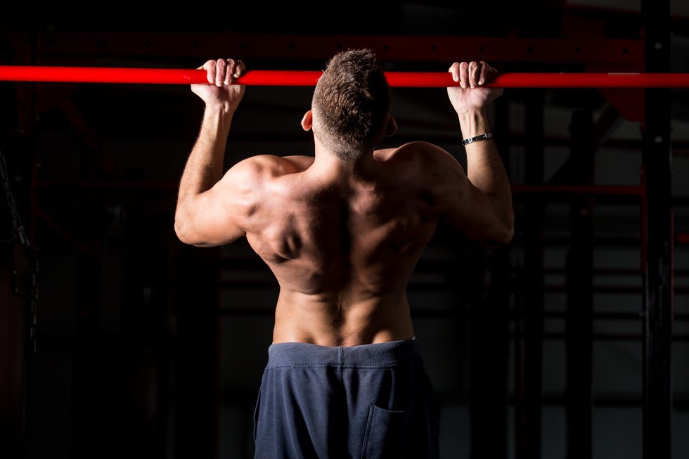 Exercising on chin-up bar