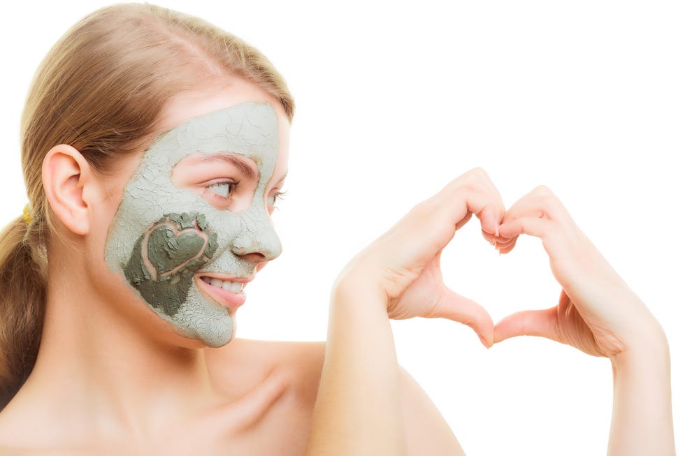 skin care woman in clay mud mask on face beautywoman,hand,hands,health,isolated,female,face,skin,wellbeing,algae,cheek,comfort,mud,treatment,condition,complexion,clay,peel,facilitate,ease,resting,relax,recover,relaxing,recovering,locking,pimple,acne,love,in love,fell in love,organic,cosmetic,rejuvenation,spa,mineral spring,medicinal spring,heart,white,pictogram,symbol,pictograph,trade symbol,skincare,girl,girls,wellness,beauty,fresh,care,natural,apply,green,mask,facial,antiaging,pamper,renewing,purifying,wellfare,antiwrinkle,cosmetology,peeloff,exfoliation