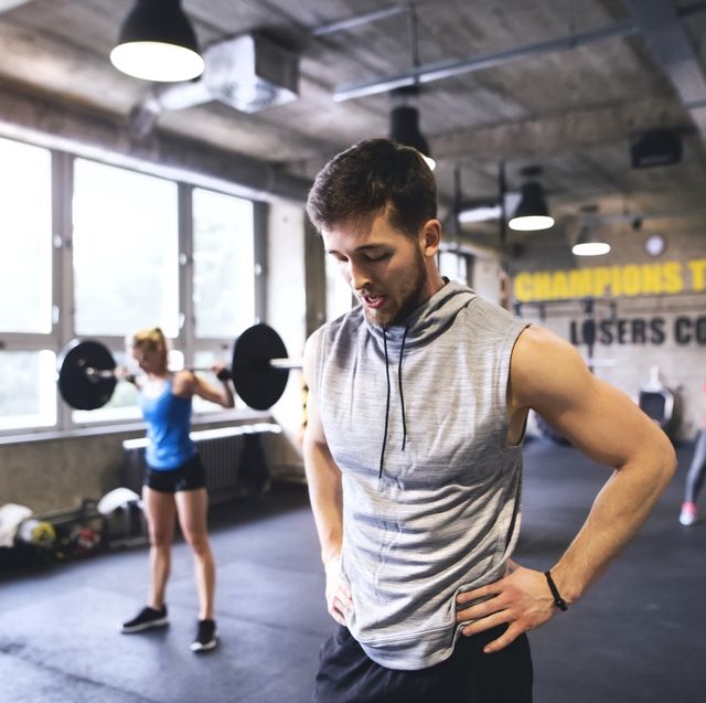 https://hips.hearstapps.com/hmg-prod/images/exhausted-young-man-in-gym-having-a-break-royalty-free-image-1694637298.jpg?crop=0.651xw:1.00xh;0.226xw,0&resize=640:*