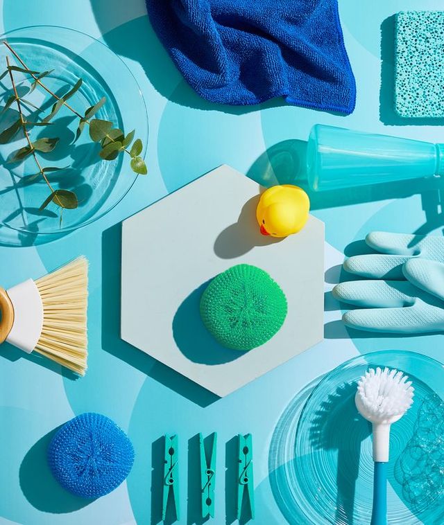 cleaning supplies on blue background