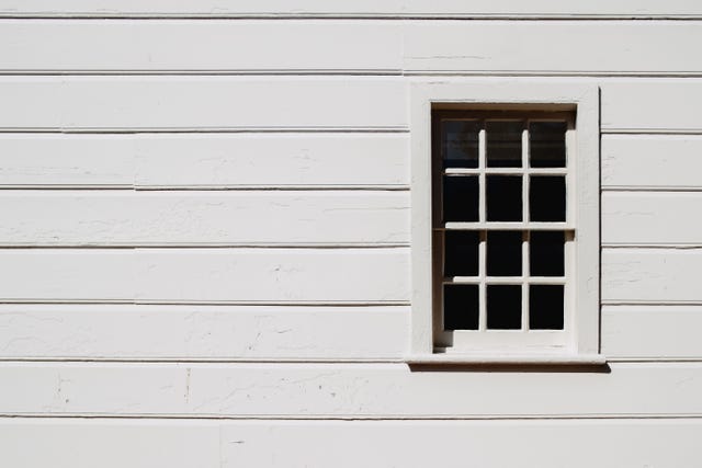 exterior building wall with single window