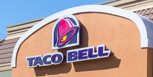 Exterior of Taco Bell fast-food restaurant with sign and logo