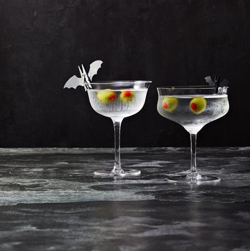 martinis with stuffed olives that look like eyeballs