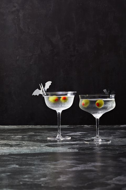 martinis with stuffed olives that look like eyeballs