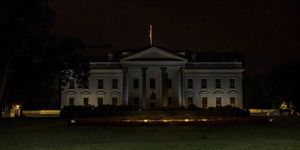 white house with the lights turned out