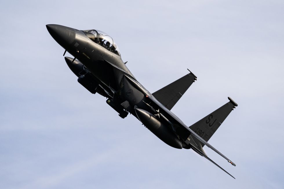 a us air force f 15e strike eagle, assigned to the 335th fighter squadron, seymour johnson air force base, north carolina, flies over air force dare bombing range, north carolina, nov 16, 2023, for exercise razor talon 24 1 rt 24 is an agile combat employment focused exercise, designed to test the 4th fighter wing's ability to operate as a lead wing to generate combat airpower while continuing to move, maneuver, sustain the wing and subordinate force elements in a dynamic contested environment us air force photo by staff sgt devin m rumbaugh