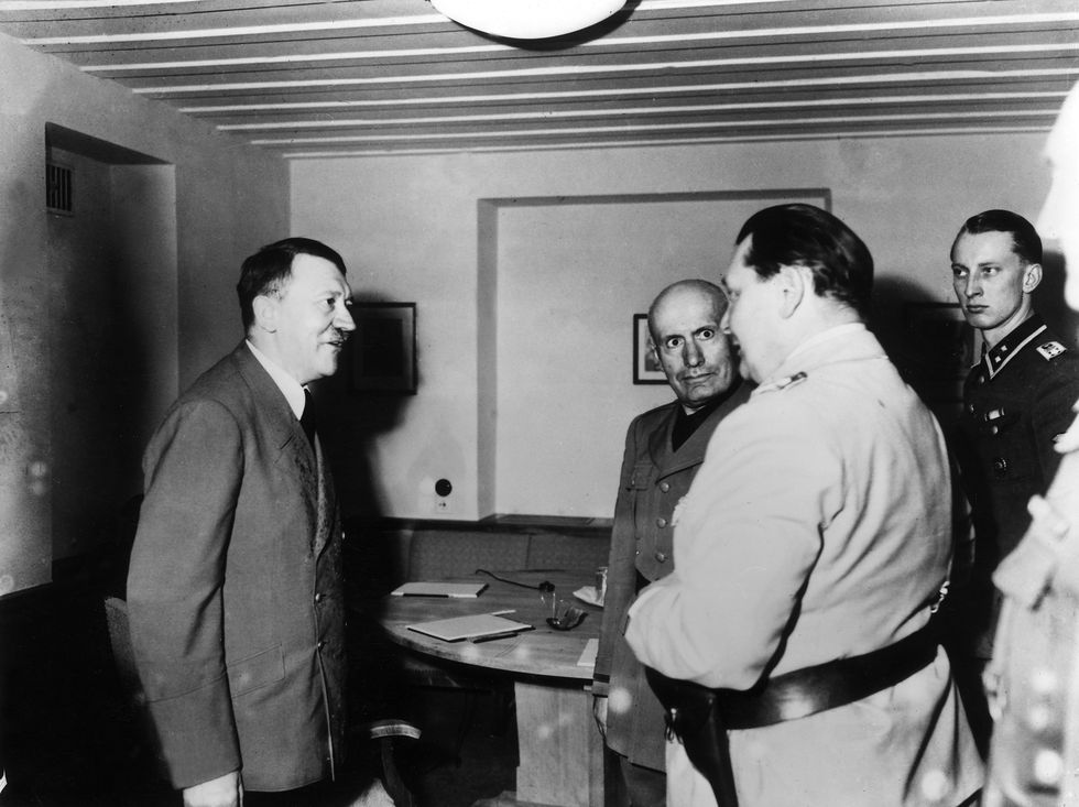 benito mussolini meets with adolf hitler and ﻿hermann göring at the ﻿wolfsschanze ﻿in 1944