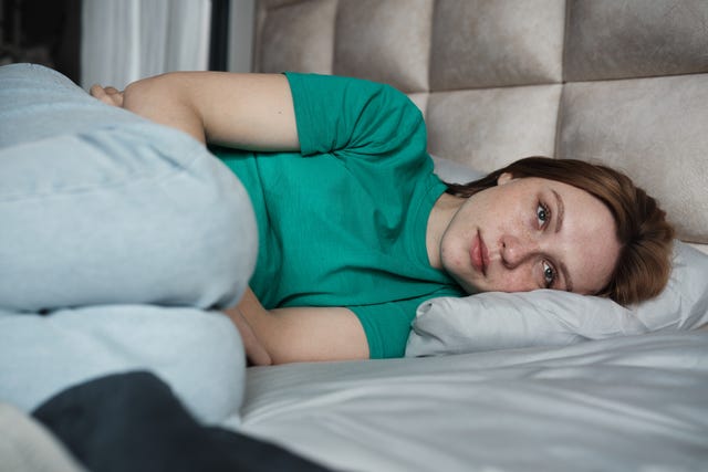 Feeling Exhausted During Your Period? Here’s Why—And What To Do, According To Doctors