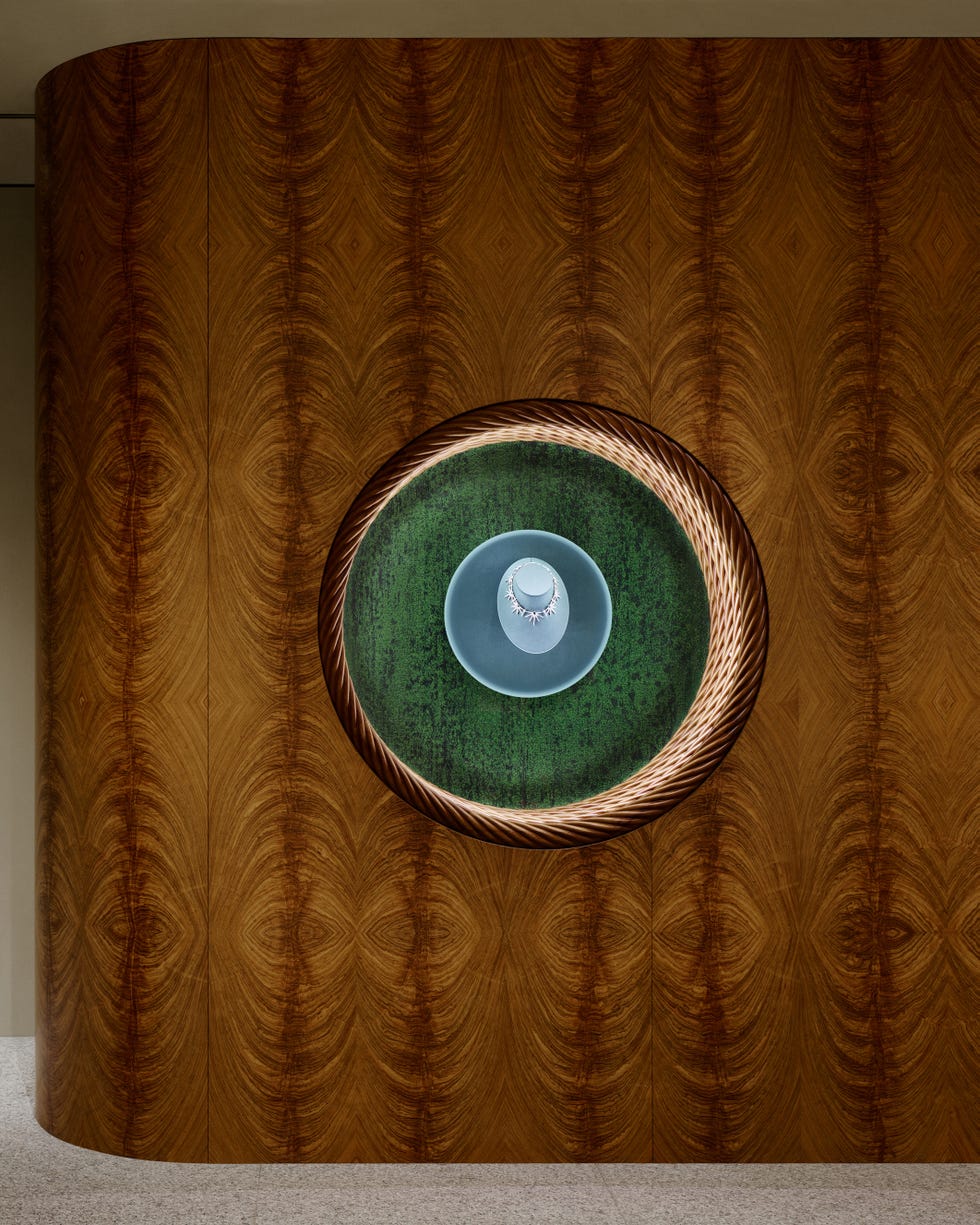 Circular design element integrated into a wooden wall.