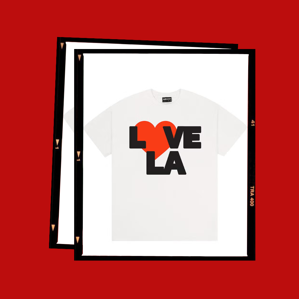 Graphic t-shirt design featuring 'LOVE LA' with a heart symbol. Graphic t-shirt design featuring 'LOVE LA' with a heart symbol.
