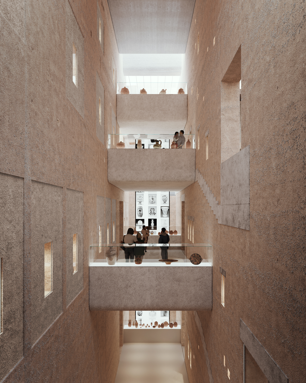Interior view of a modern gallery or museum showcasing artifacts and artwork.