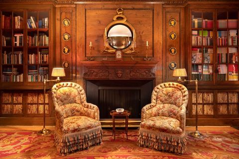 Furniture, Room, Living room, Couch, Interior design, Building, Bookcase, Classic, Home, Club chair, 