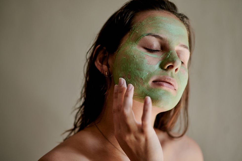 face, beauty and woman using cosmetic product facial treatment, skincare and self care in her home or house detox, mask and female cleaning her skin for morning routine, relax and eyes closed