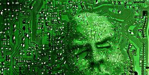 face emerging from circuit board digital composite