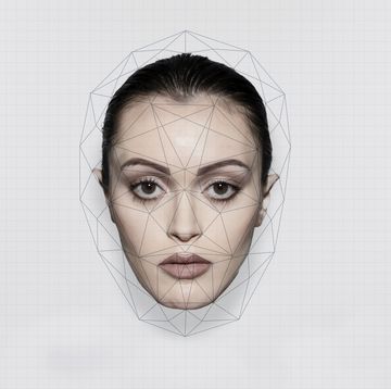 face recognition analyzing on woman's face over white background