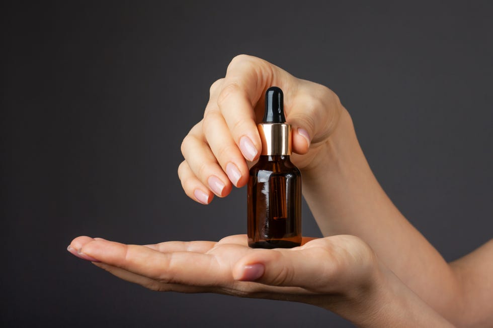 face serum and vitamin capsules