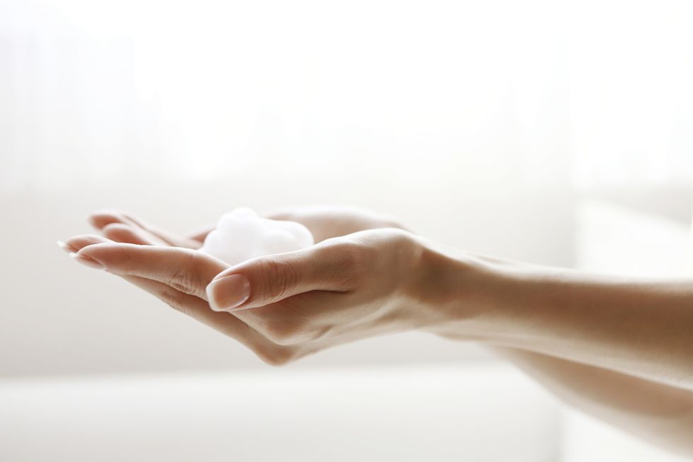 face wash foam on hands