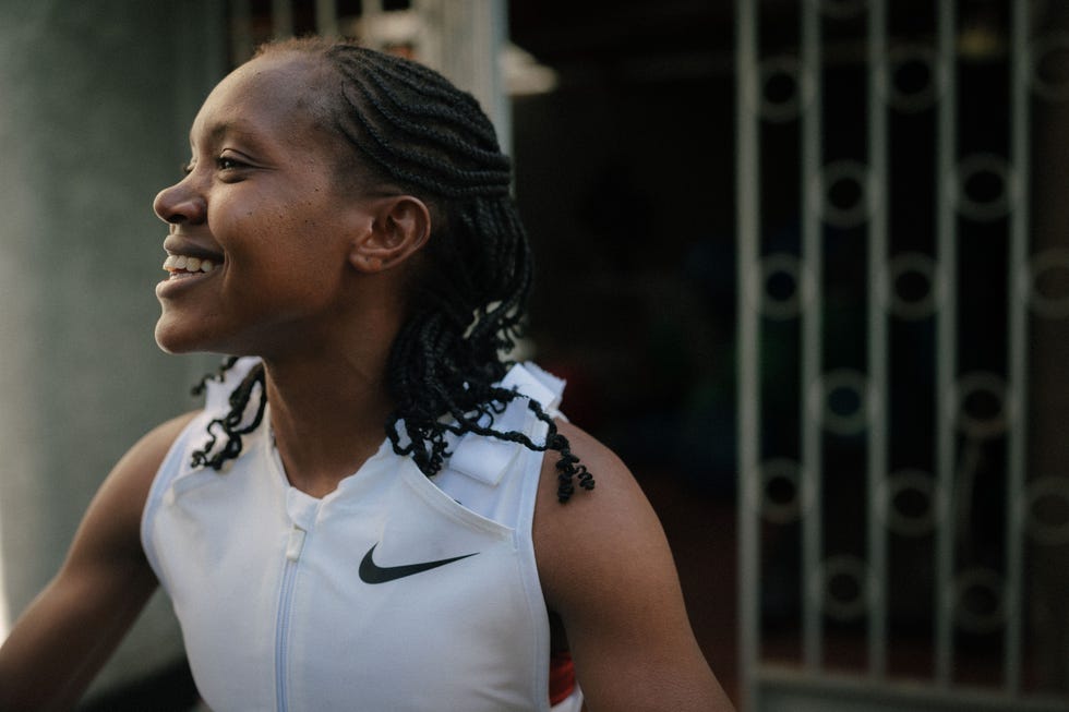 faith kipyegon smiling in nike kit