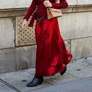 paris, france september 30 blanca miro scrimieri wears red pleated skirt, turtleneck, brown bag outside hermes during the womenswear springsummer 2024 as part of paris fashion week on september 30, 2023 in paris, france photo by christian vieriggetty images