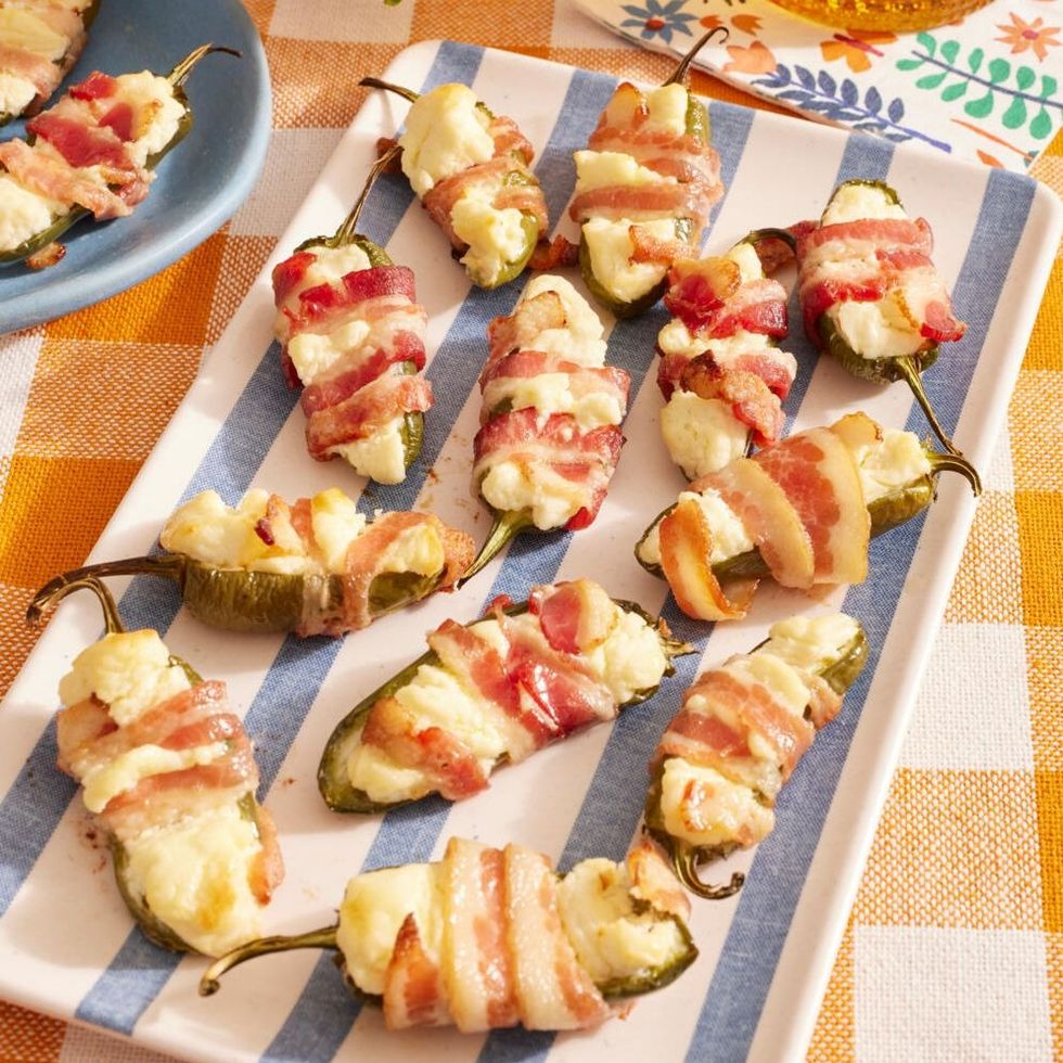 https://hips.hearstapps.com/hmg-prod/images/fall-appetizers-bacon-wrapped-jalapeno-thingies-64f8b9a44ea6e.jpeg?crop=1xw:0.9989949748743718xh;center,top&resize=980:*