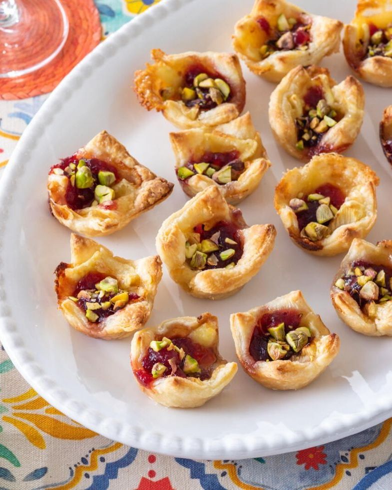 cranberry brie bites on white plate