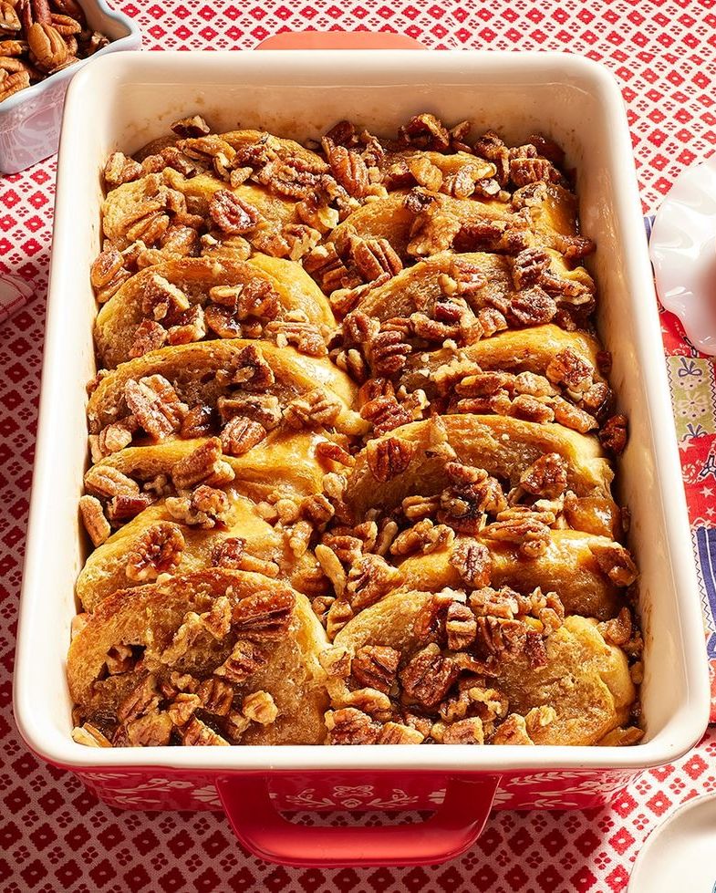 pecan pie french toast casserole in red baking dish
