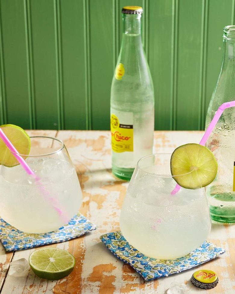 ranch water with limes and topo chico bottles