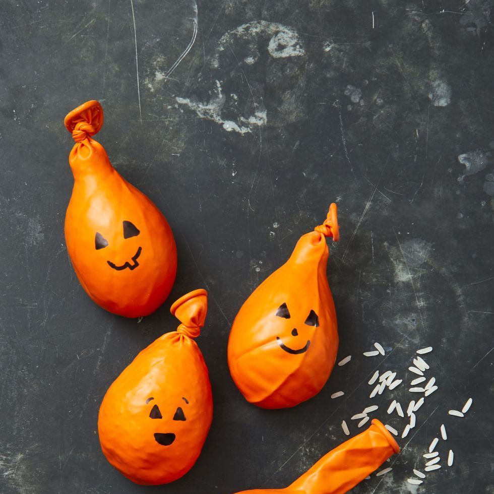 fall crafts for kids pumpkin stress balls with orange balloons
