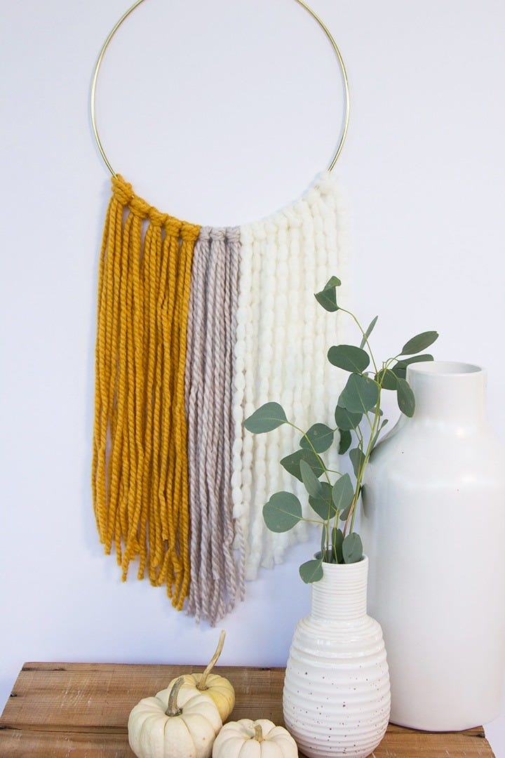 fall crafts yarn wall hanging on the wall