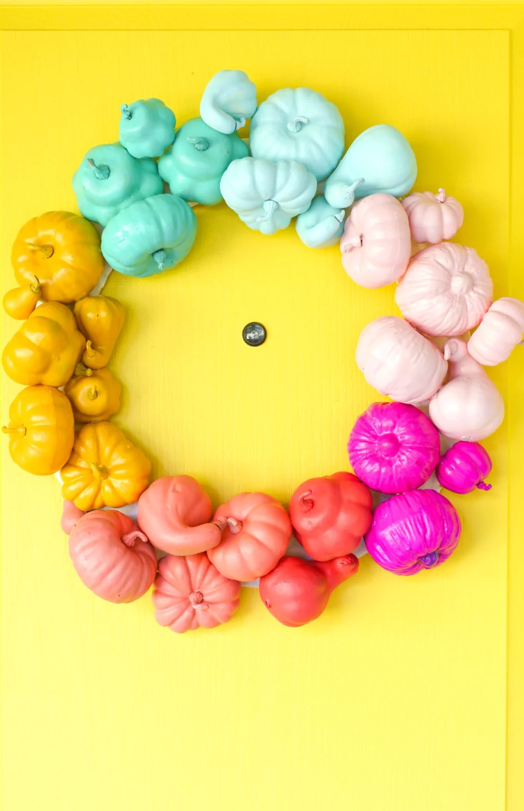 fall ecor ideas colorful pumpkin wreath on the yellow door