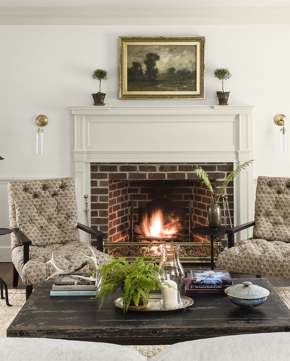 colonial revival home designed by lauren liess living room, sitting area, fireplace