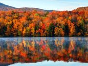 early morning autumn light near killington, vermont photo taken on a calm tranquil colorful morning during the peak autumn foliage season vermonts beautiful fall foliage ranks with the best in new england bringing out some of  the most colorful foliage in the united states