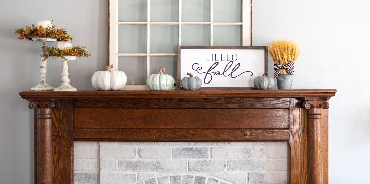 stylish fall decorations on the mantel at home
