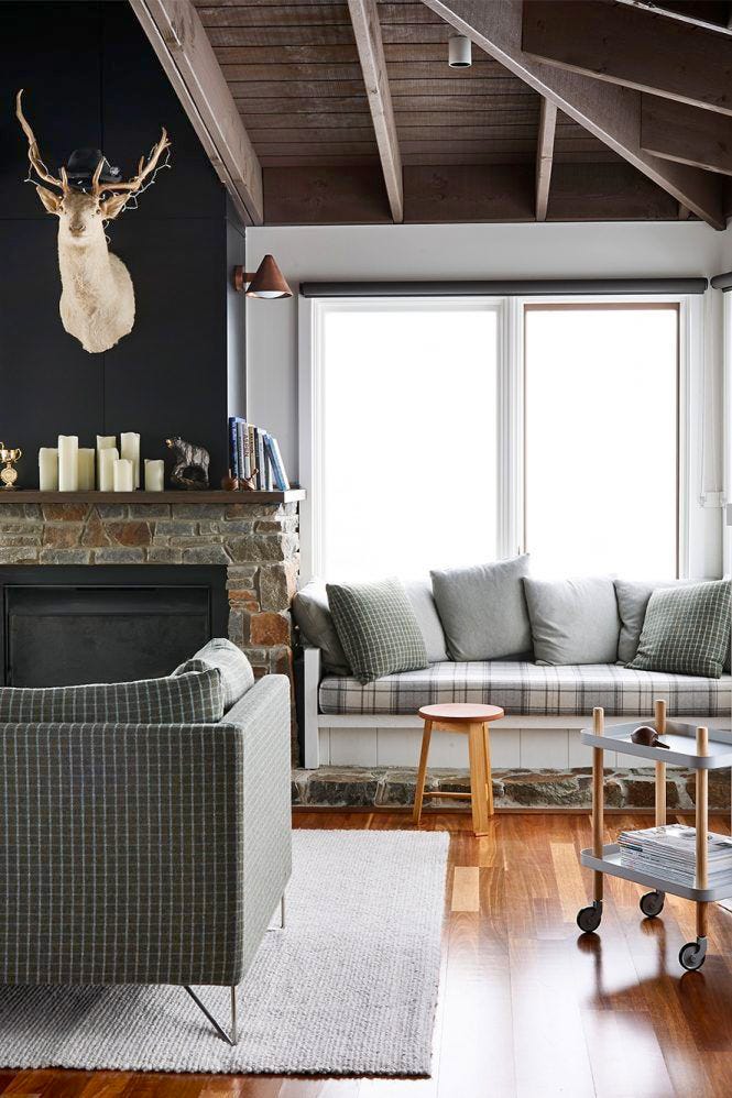 mountain home living room with stone fireplace