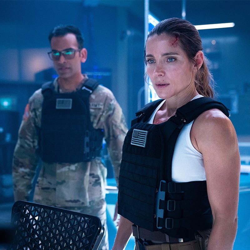 mayen mehta as shah and elsa pataky as jj collins in interceptor