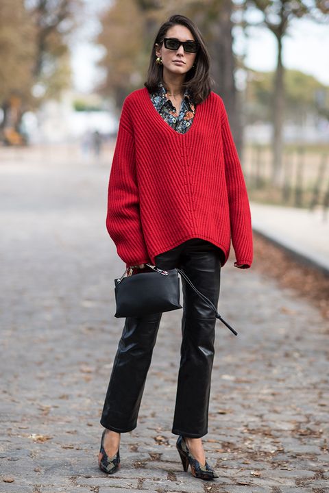 red sweater and leather pants