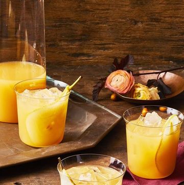 yellow orange fall cocktails with pear slices